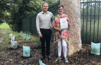 Kara Osborne, a NSW Teachers Federation Representative, in front of the garden funded by the Tree Levy grant at Cardiff High School.