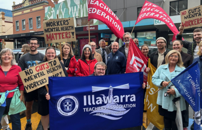 Dozens of people protest in a rally in Wollongong to oppose the threat to workers compensation for mental health injuries.