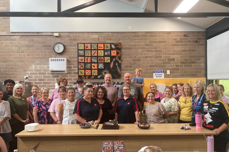 Features cleaners in new uniform with staff and UWU organiser at Wyong Public School in the Central Coast.